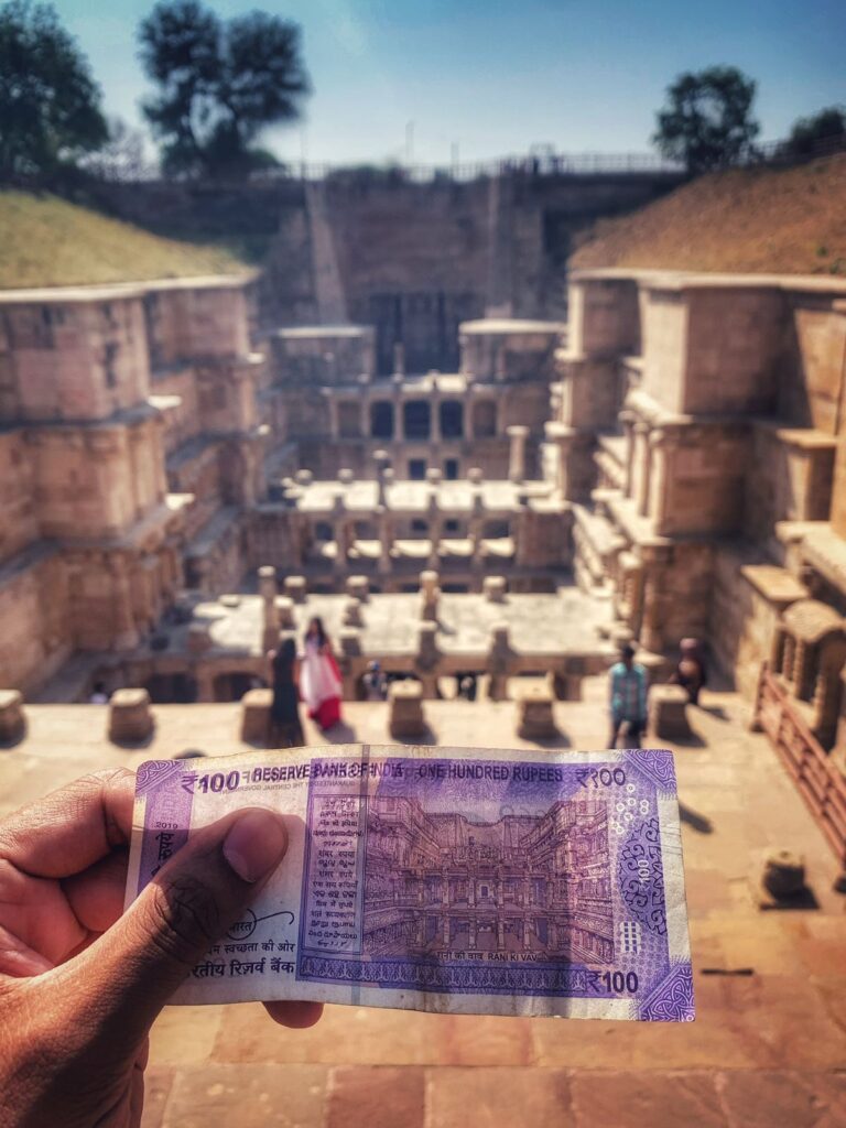 INR 100 with the photograph of stepwell